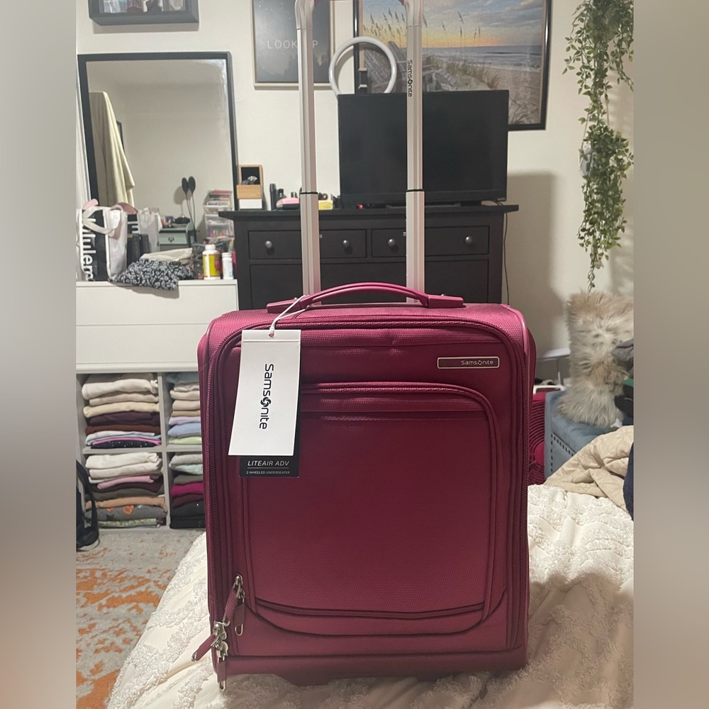 Pink Samsonite 16” underseater.